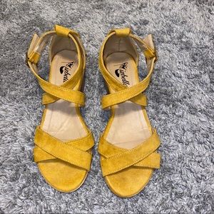 Yellow strappy sandals